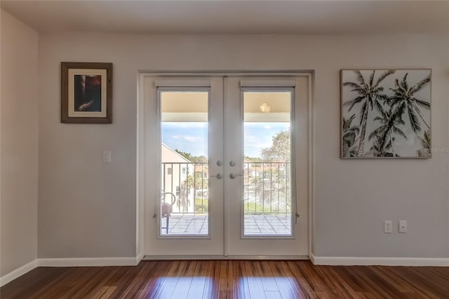 doorway to outside featuring dark hardwood / wood-style floors and french doors