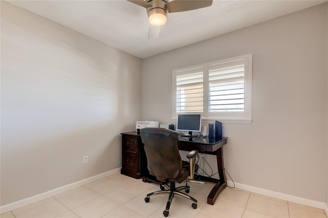 office space featuring ceiling fan and light tile patterned flooring