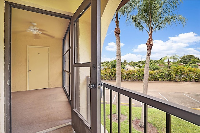 balcony featuring ceiling fan