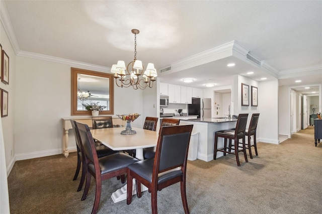 dining room featuring carpet, a notable chandelier, and ornamental molding