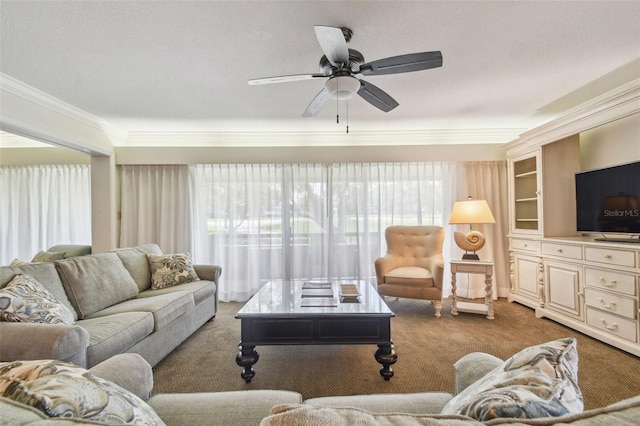 living room featuring carpet flooring, ceiling fan, and crown molding