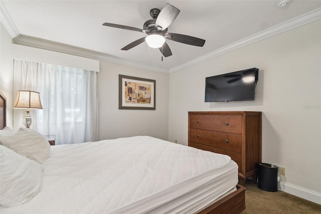 bedroom with ceiling fan, ornamental molding, and dark colored carpet