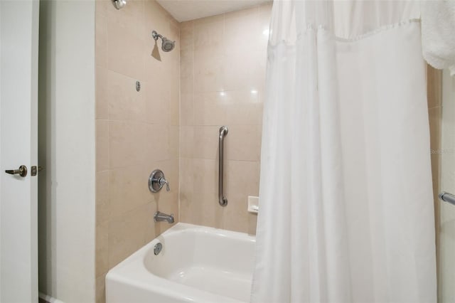 bathroom with shower / tub combo