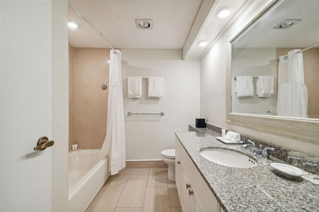 full bathroom featuring vanity, toilet, and shower / bathtub combination with curtain