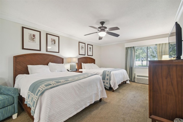 bedroom featuring carpet flooring, ceiling fan, crown molding, and an AC wall unit