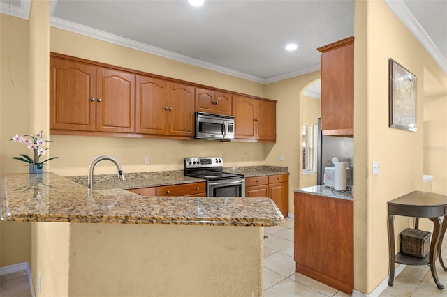 kitchen featuring kitchen peninsula, light stone countertops, crown molding, and stainless steel appliances