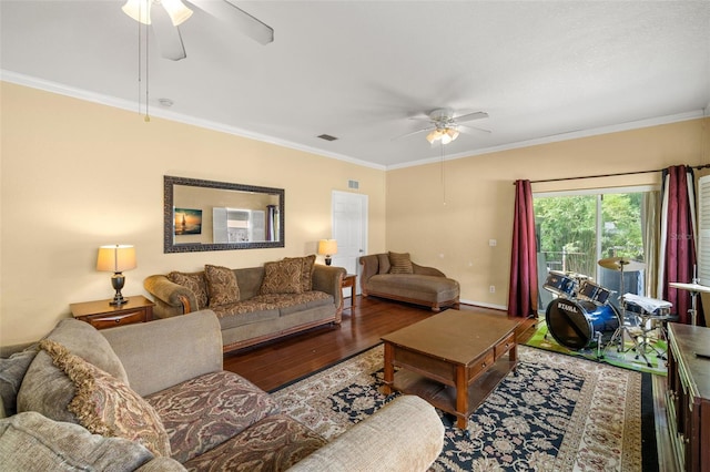 living room with ceiling fan, hardwood / wood-style floors, and ornamental molding