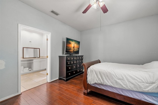 bedroom with hardwood / wood-style flooring and ceiling fan