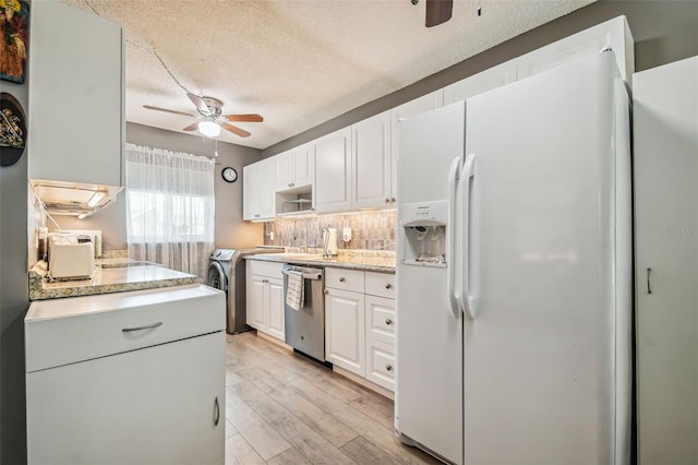 kitchen featuring light hardwood / wood-style flooring, white cabinets, stainless steel dishwasher, ceiling fan, and white fridge with ice dispenser