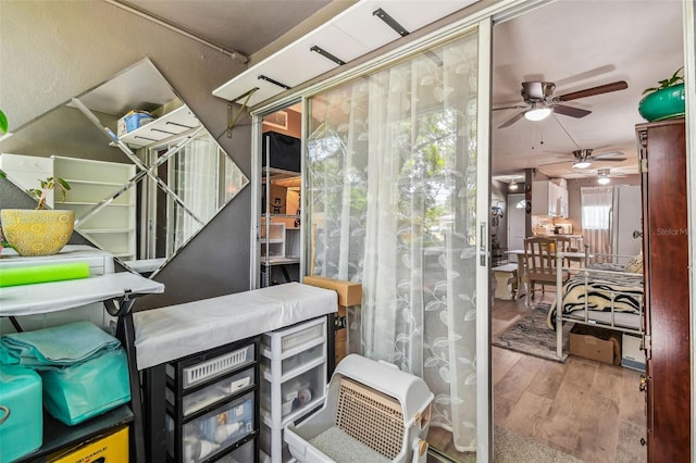 interior space featuring ceiling fan