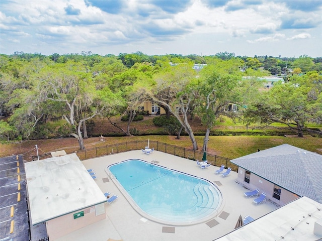 view of swimming pool with a patio area