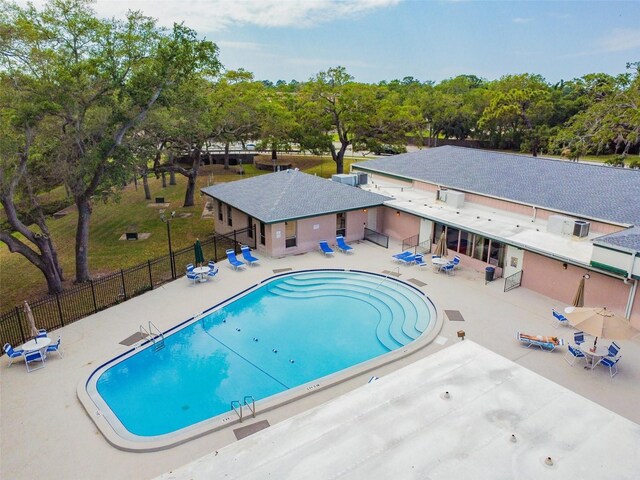 view of swimming pool with a patio