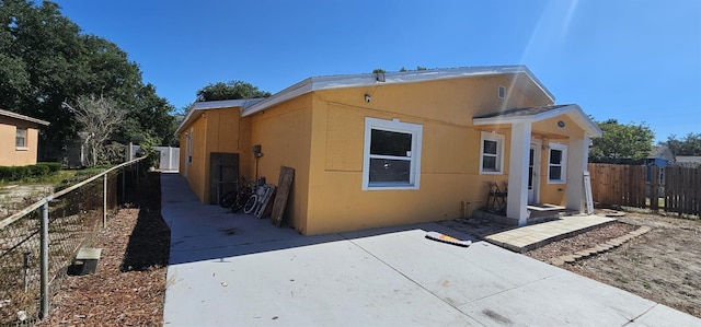 view of front facade with a patio area