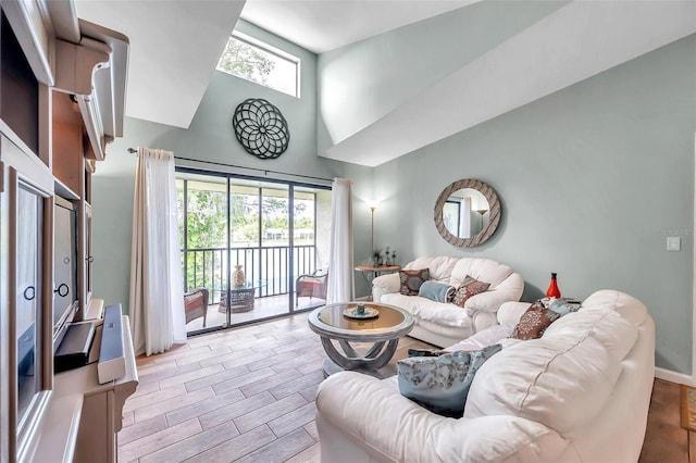 living room featuring a high ceiling