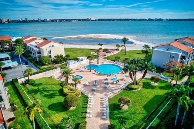 aerial view with a beach view and a water view