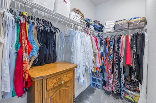 spacious closet with carpet floors