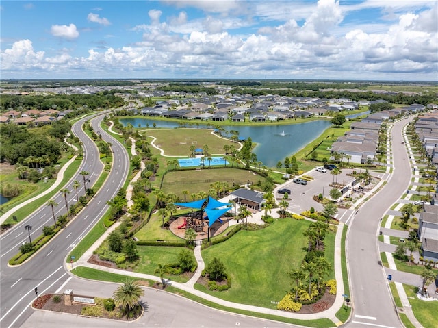 drone / aerial view with a water view