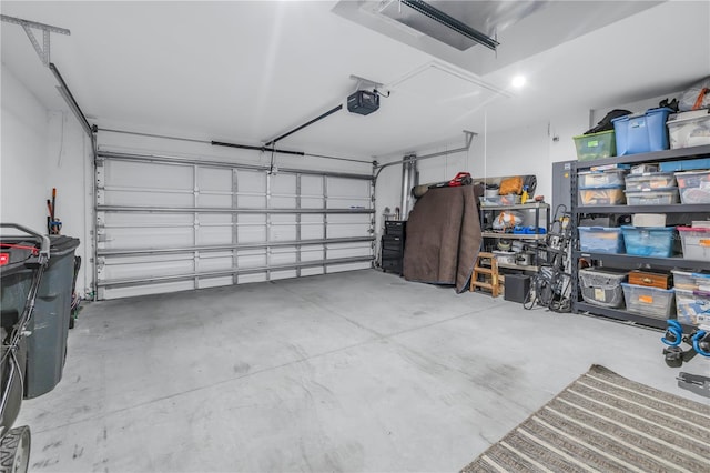 garage featuring a garage door opener