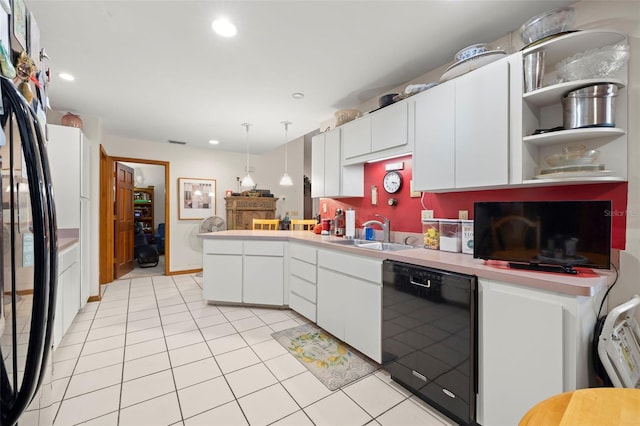 kitchen with white cabinetry, dishwasher, sink, pendant lighting, and light tile patterned flooring