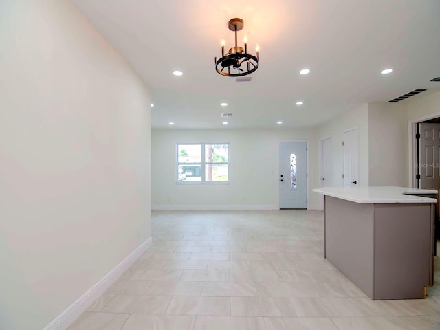 kitchen featuring a notable chandelier