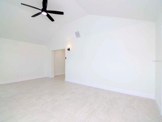 spare room with lofted ceiling and ceiling fan