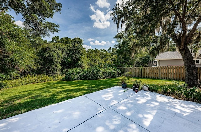 view of patio featuring fence