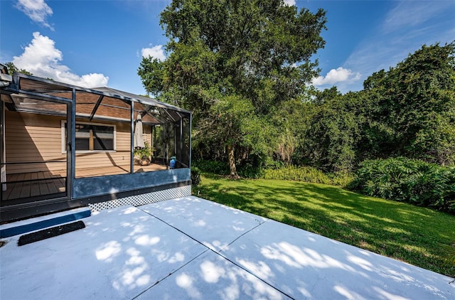 view of patio / terrace featuring a lanai