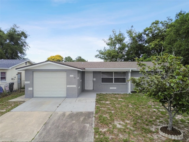 single story home featuring a garage