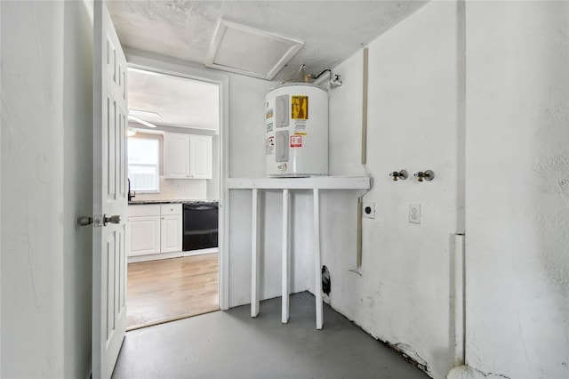 utility room with electric water heater