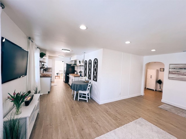 living room featuring light wood-type flooring