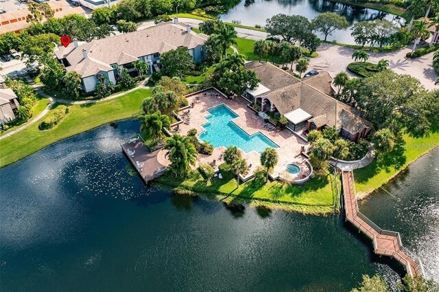 drone / aerial view with a water view