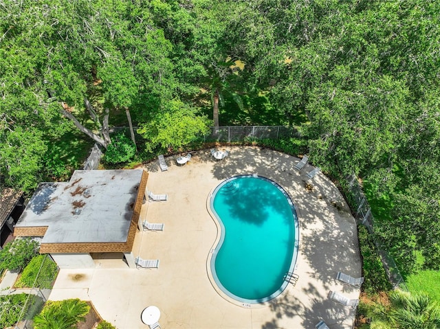 view of swimming pool with a patio