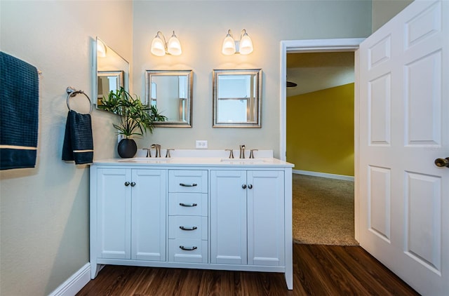 bathroom featuring hardwood / wood-style floors and vanity