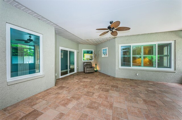 view of patio / terrace featuring ceiling fan