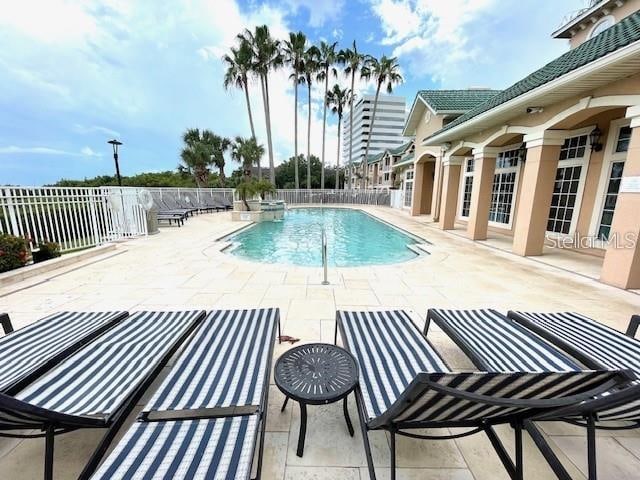 view of swimming pool featuring a patio