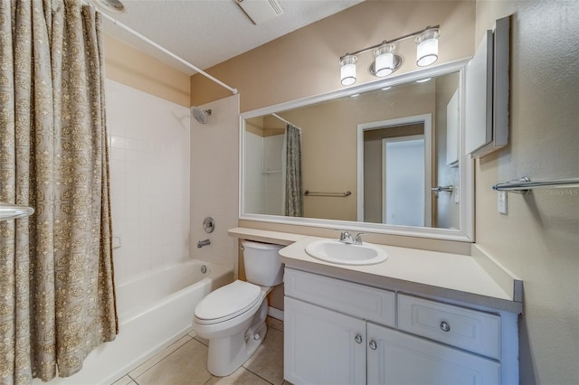 full bathroom with shower / bath combination with curtain, tile patterned floors, vanity, a textured ceiling, and toilet