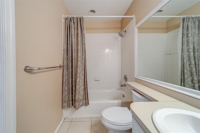 full bathroom featuring vanity, shower / bath combo, tile patterned flooring, toilet, and a textured ceiling