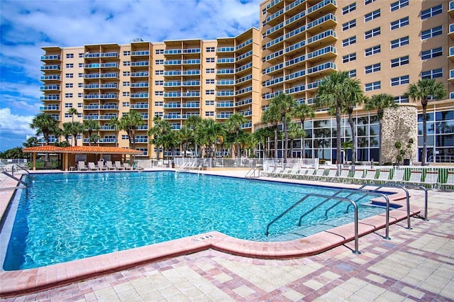 view of swimming pool featuring a patio area