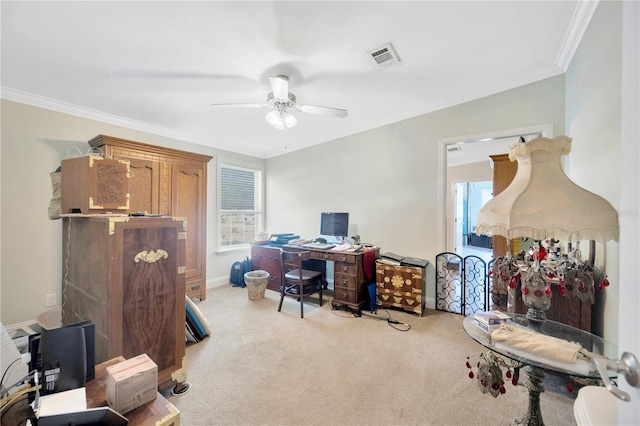 carpeted office featuring a wealth of natural light, ceiling fan, and crown molding