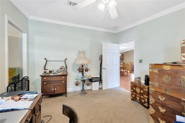 office area with light colored carpet, ceiling fan, and crown molding