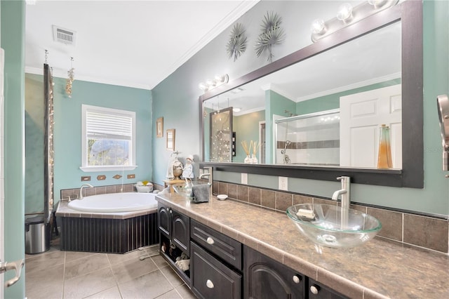 bathroom with vanity, separate shower and tub, tile patterned floors, and crown molding