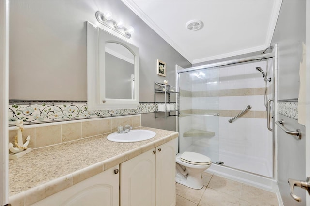 bathroom featuring vanity, toilet, walk in shower, and crown molding