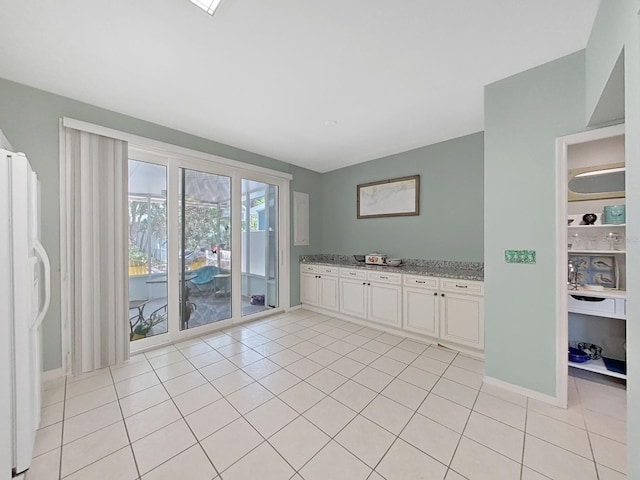 interior space featuring tile patterned flooring