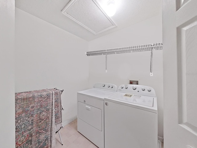 washroom featuring separate washer and dryer