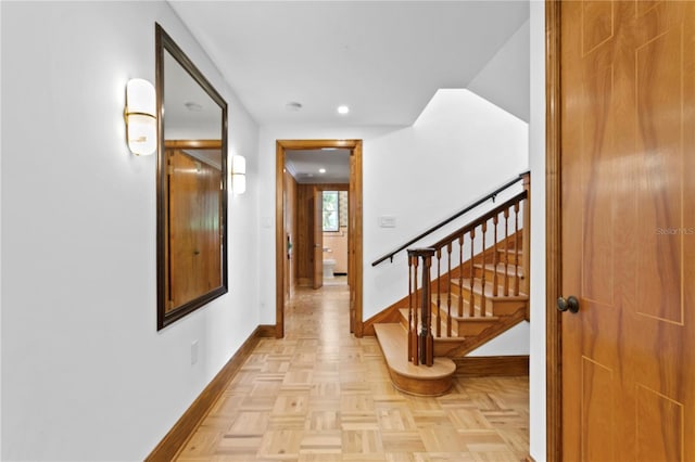 corridor featuring light parquet flooring