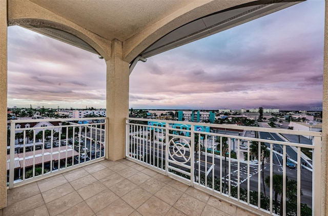 view of balcony at dusk