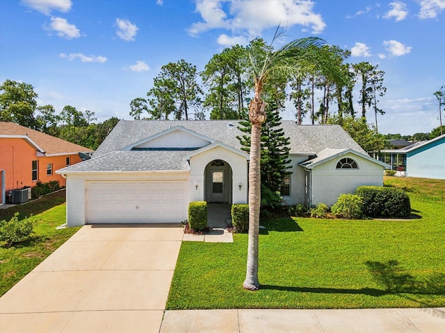 single story home featuring a front yard, a garage, and cooling unit