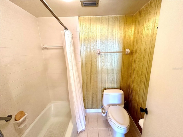 bathroom with toilet, tile patterned flooring, and shower / bathtub combination with curtain