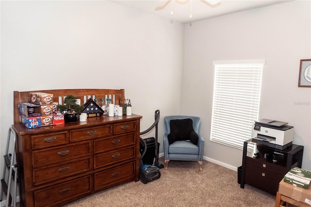 living area featuring ceiling fan and light colored carpet