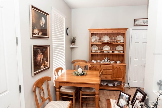 dining area featuring hardwood / wood-style flooring